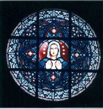 Stained glass window located at St. Mary Star of the Sea Catholic Church in Port Townsend, Washington.  Appears above the altar, allowing light to shine through it into the church interior.